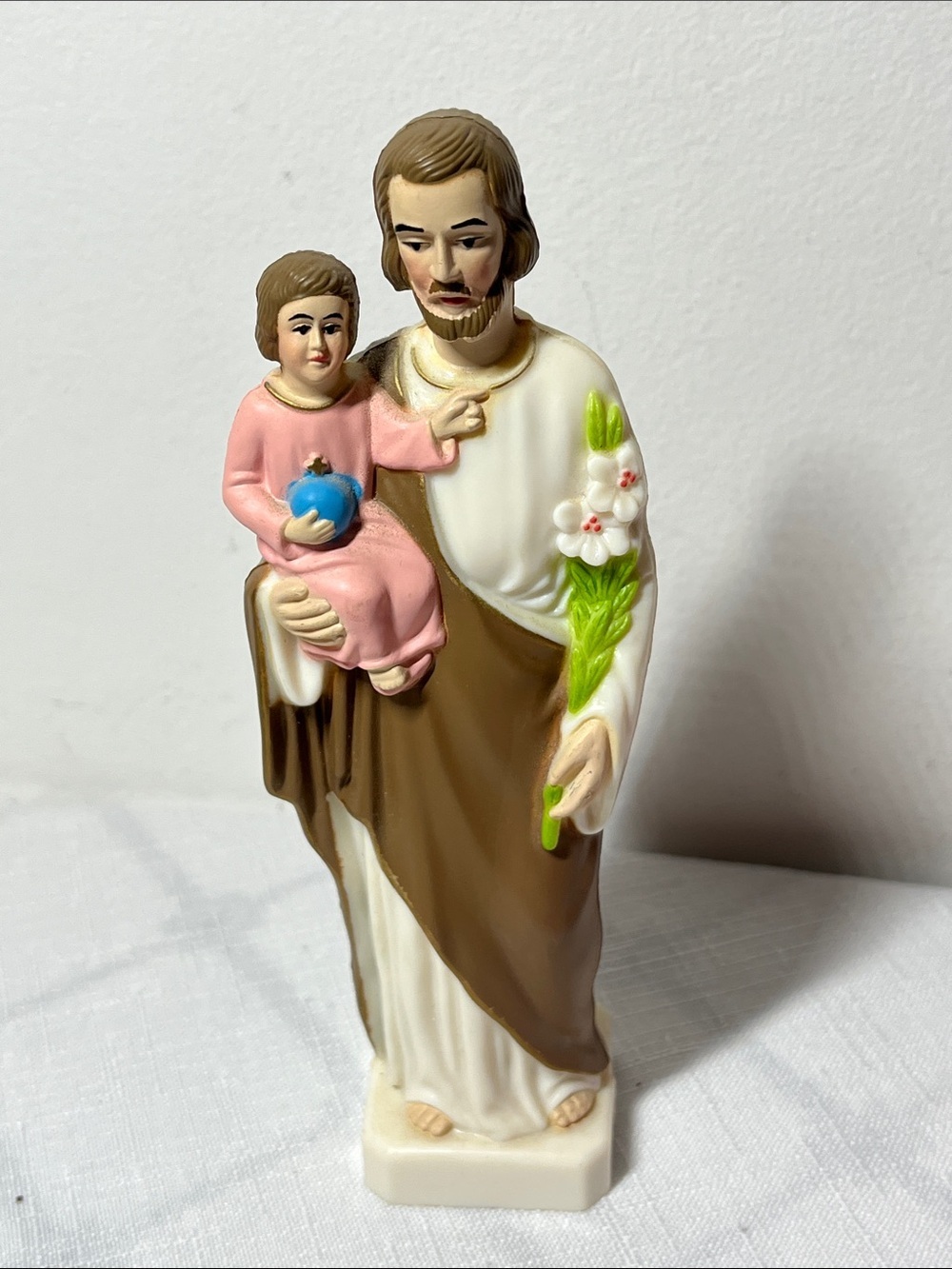 Religious Saint Statue with child Figurine in Brown, White & Pink
Vintage